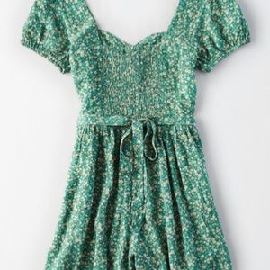 Green romper with flowers